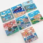 Flat Lay Display of Weihai Tourist Souvenir Fridge Magnets