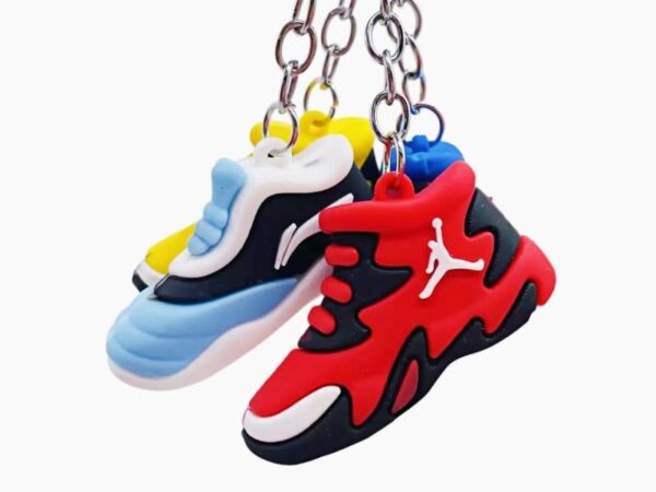 Flexible custom keychains with molded characters