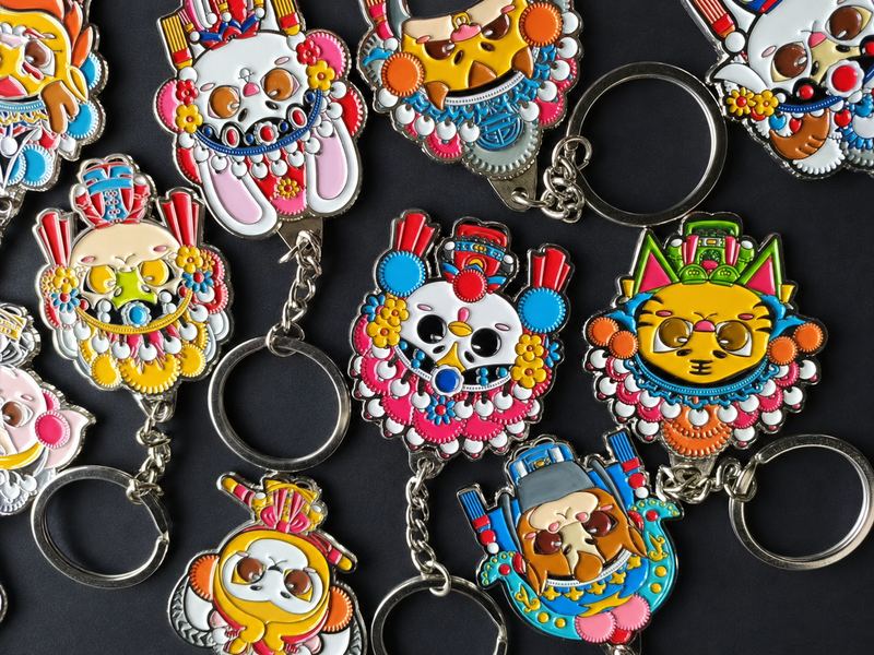 Traditional style metal enamel keychains with colorful decorative designs