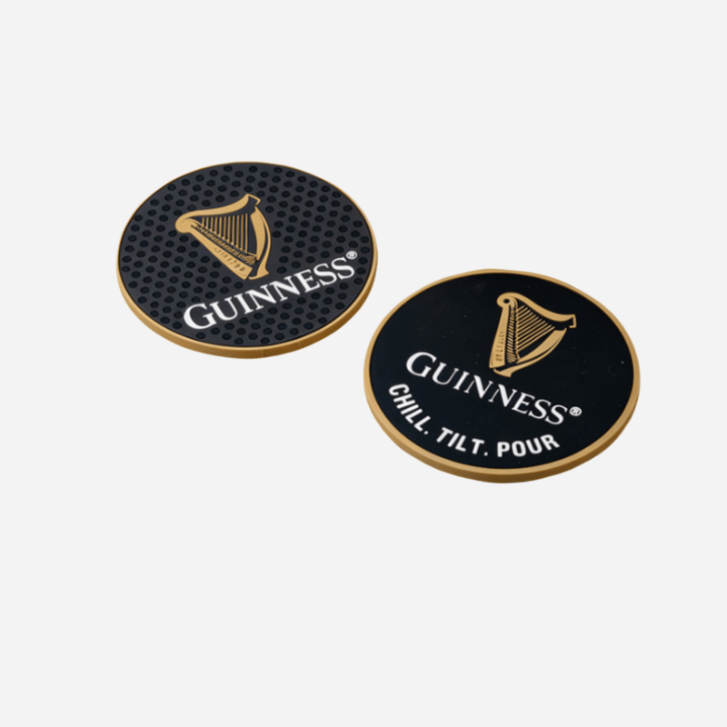 Custom PVC coasters featuring branded beer logos