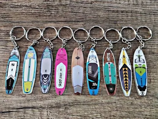 Assorted custom keychains organized for an international order