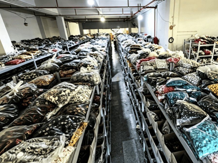 Bulk custom keychains prepared for final factory inspection
