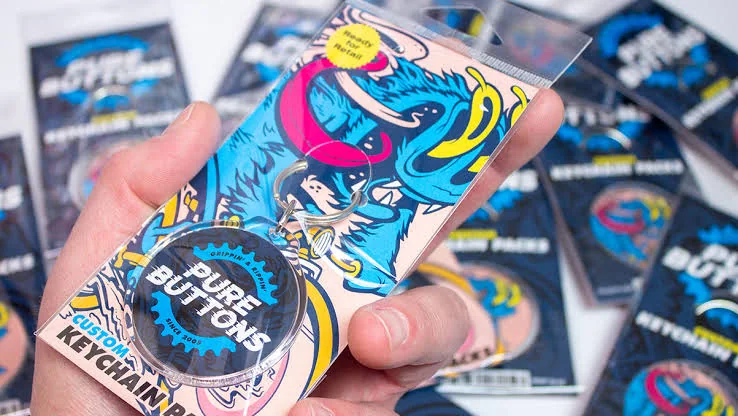 Custom keychain in printed retail sleeve packaging