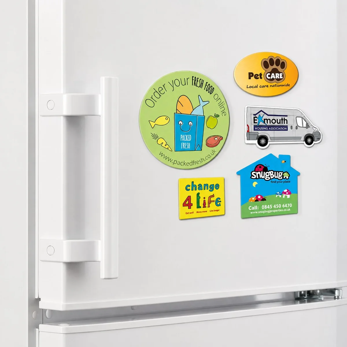 Custom magnets on a fridge for food delivery services and local household businesses