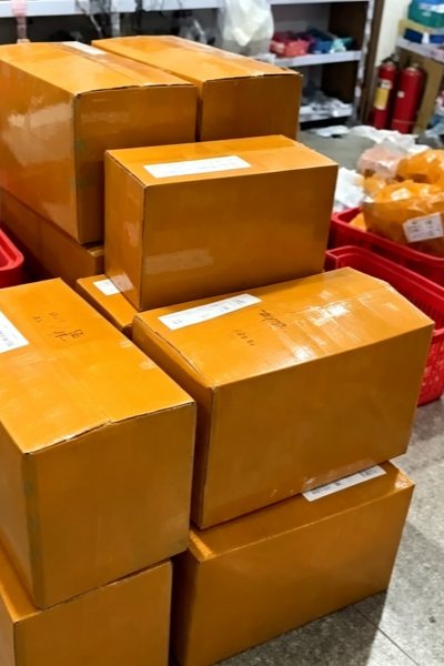 Packed bulk keychain cartons ready for dispatch