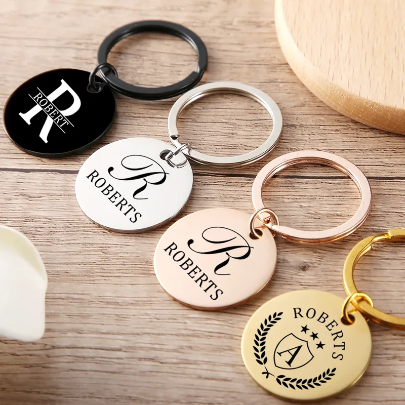 Personalized round metal keychains with printed logos