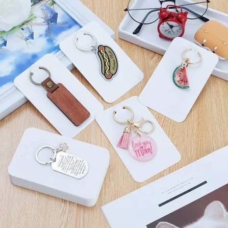 Retail keychains arranged on backing cards