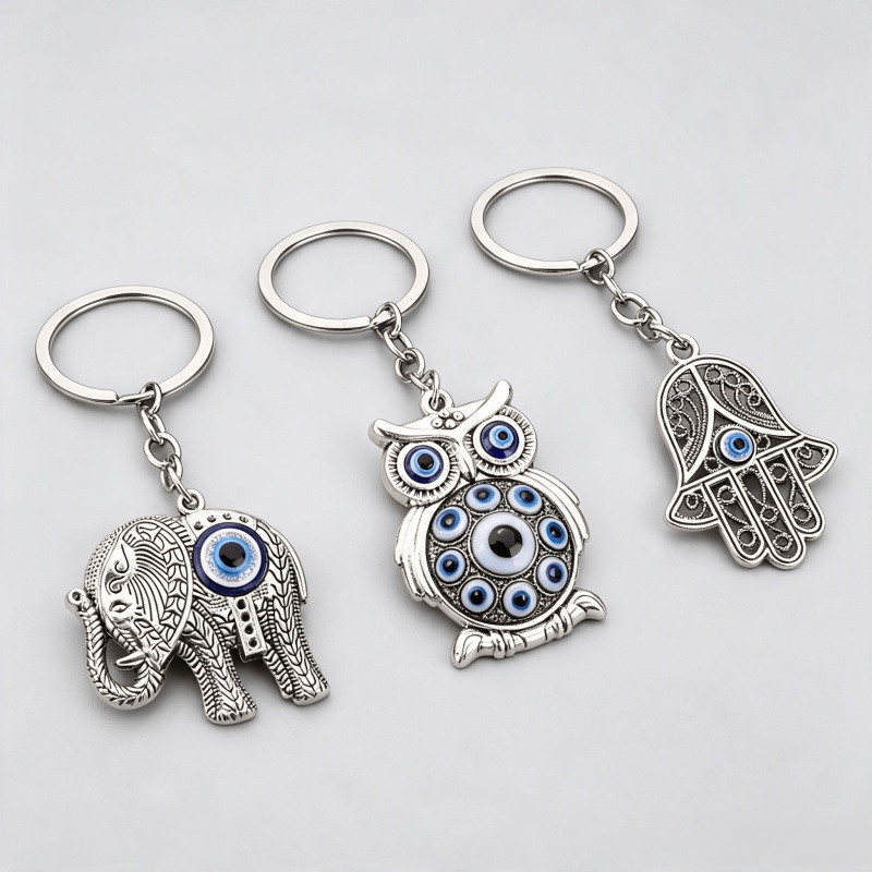Silver symbol metal keychains with detailed attachments
