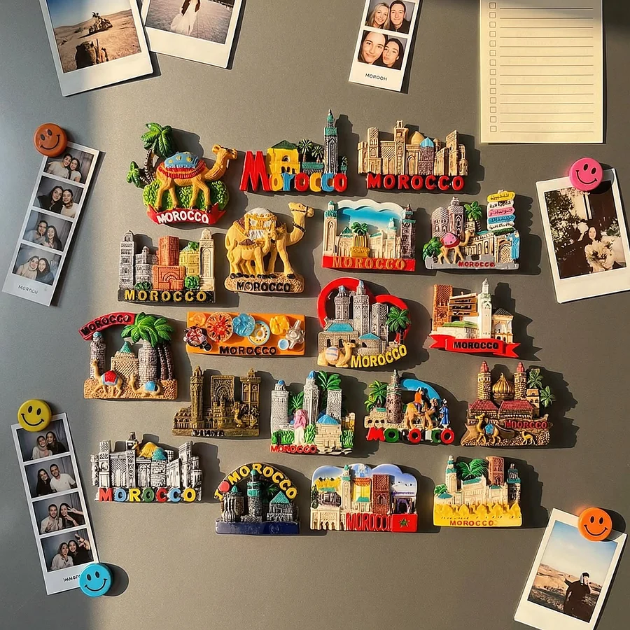 Custom souvenir fridge magnets arranged on a refrigerator for backing evaluation