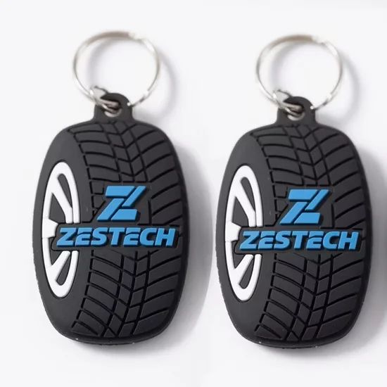 Tire-shaped rubber keychain with carabiner hardware