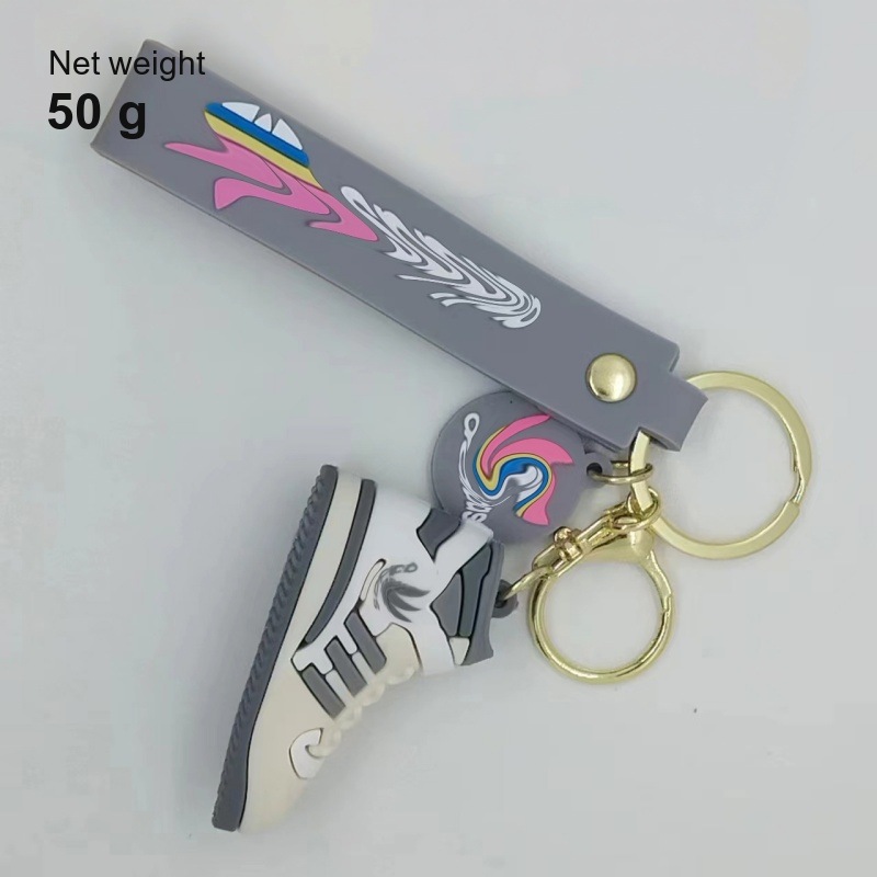 Adidas shoe keychain reference weight: 50 g with the tag strap, the disc and the split ring fitted