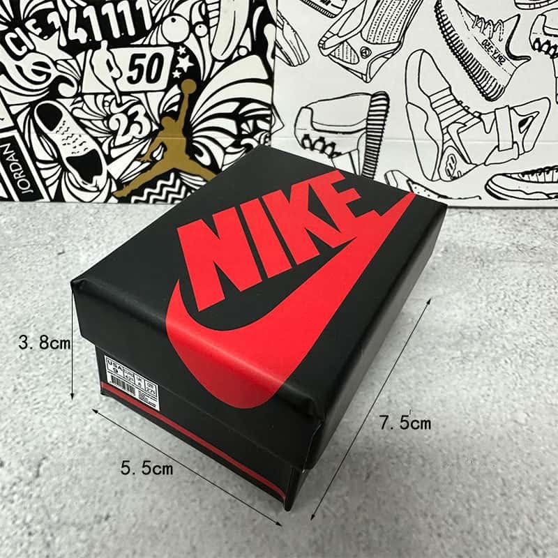 Air Force One shoe keychain supplied in a printed sneaker gift box, with the carton marked 5.5 x 7.5 x 3.8 cm