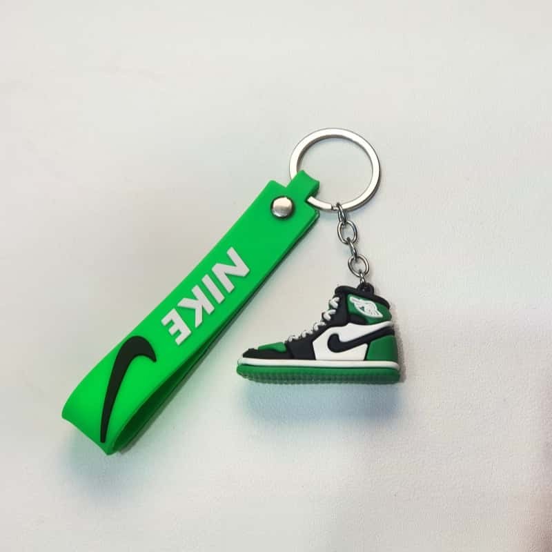 Air Jordan keychains with a moulded swing tag in green, the flat face used to carry a customer logo