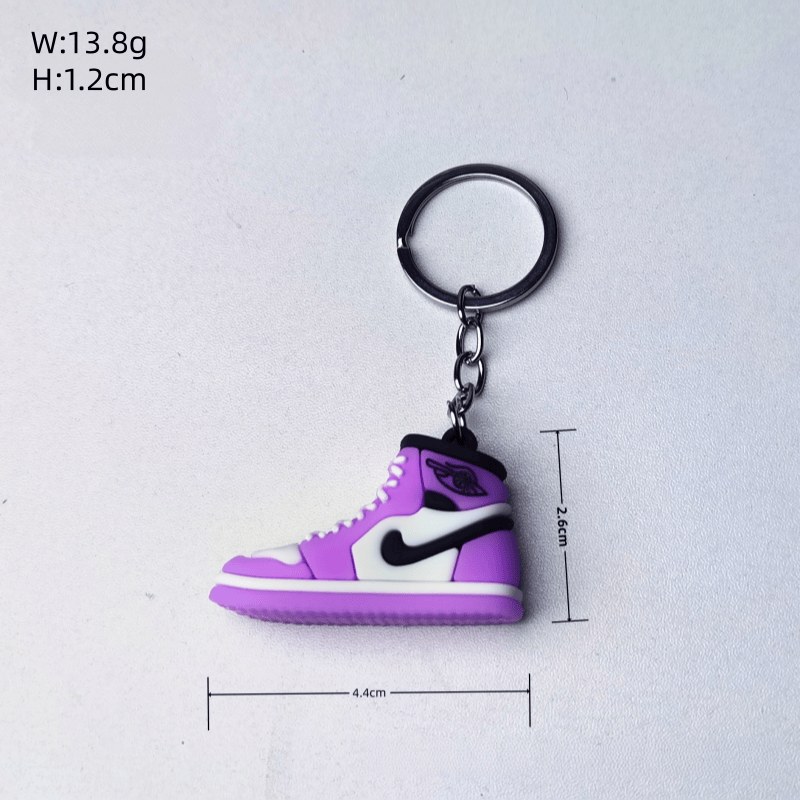 Air Jordan keychains size chart: a 4.4 cm high-top sneaker keychain measured against a ruler