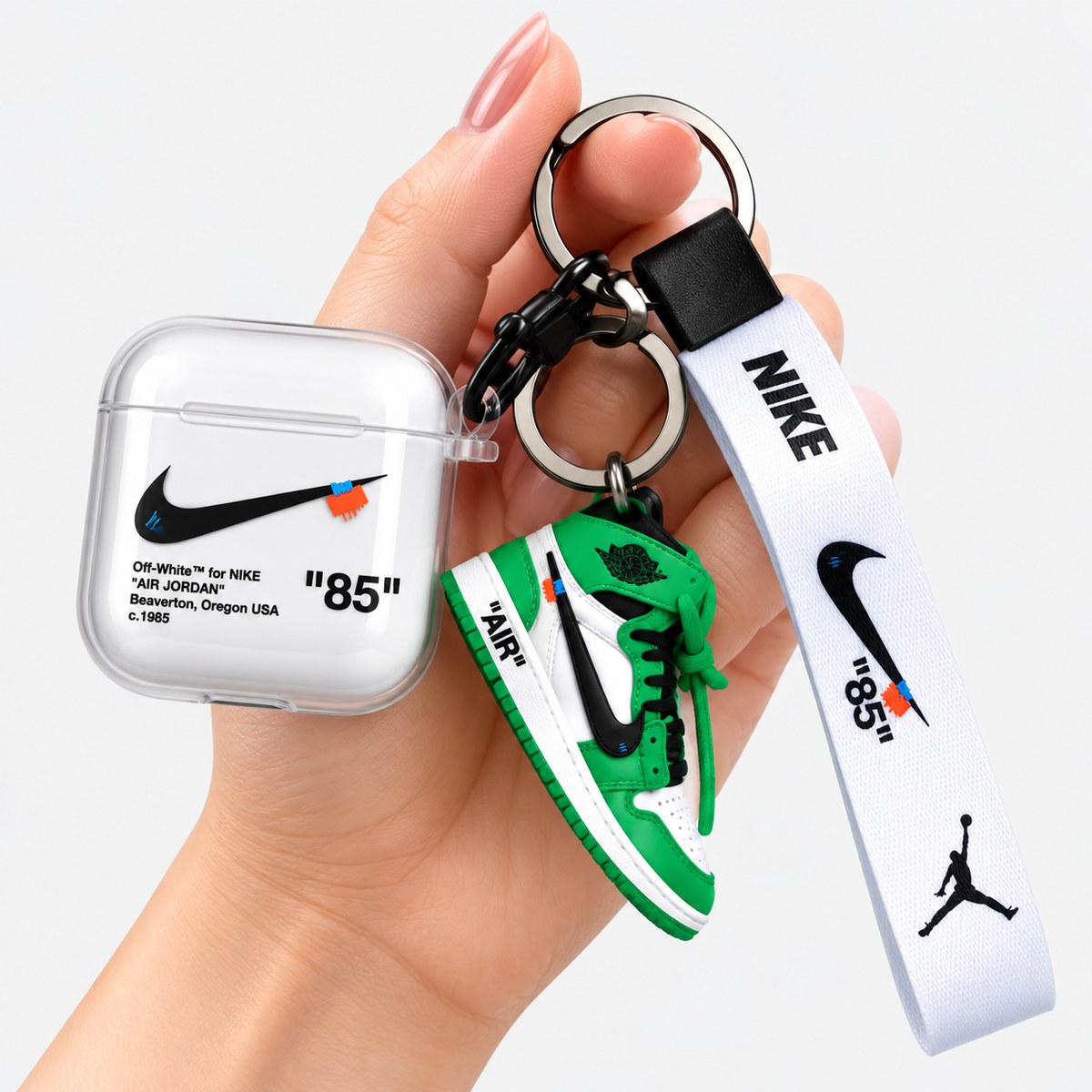 AirPod case with shoe keychain on a keyring, made for tech accessory and retail merchandise