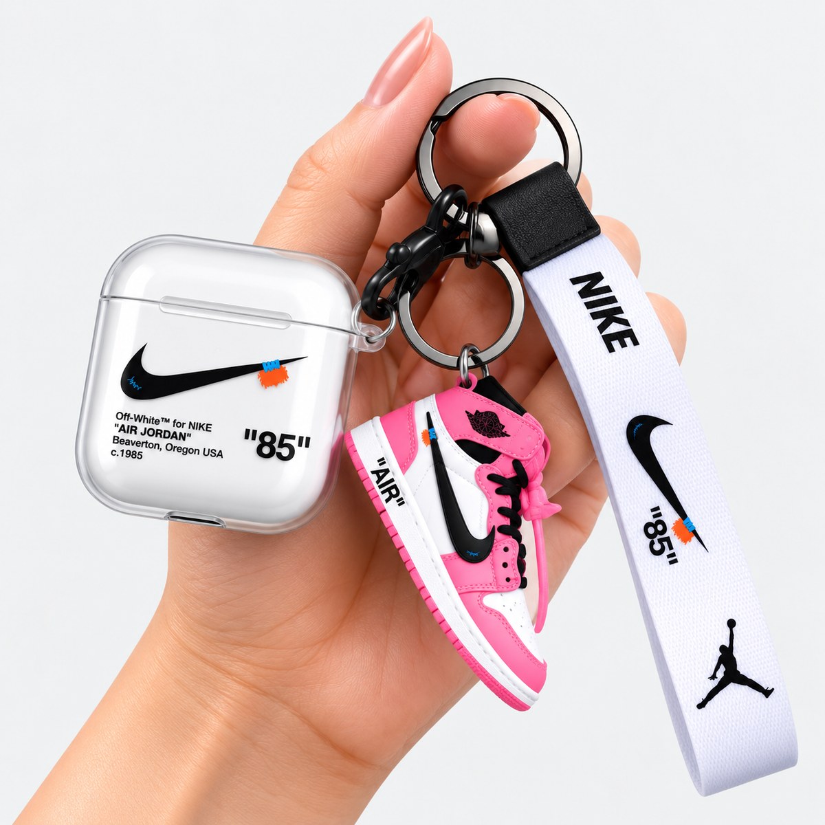 AirPod case with shoe keychain product view, clear TPU shell with sneaker charm