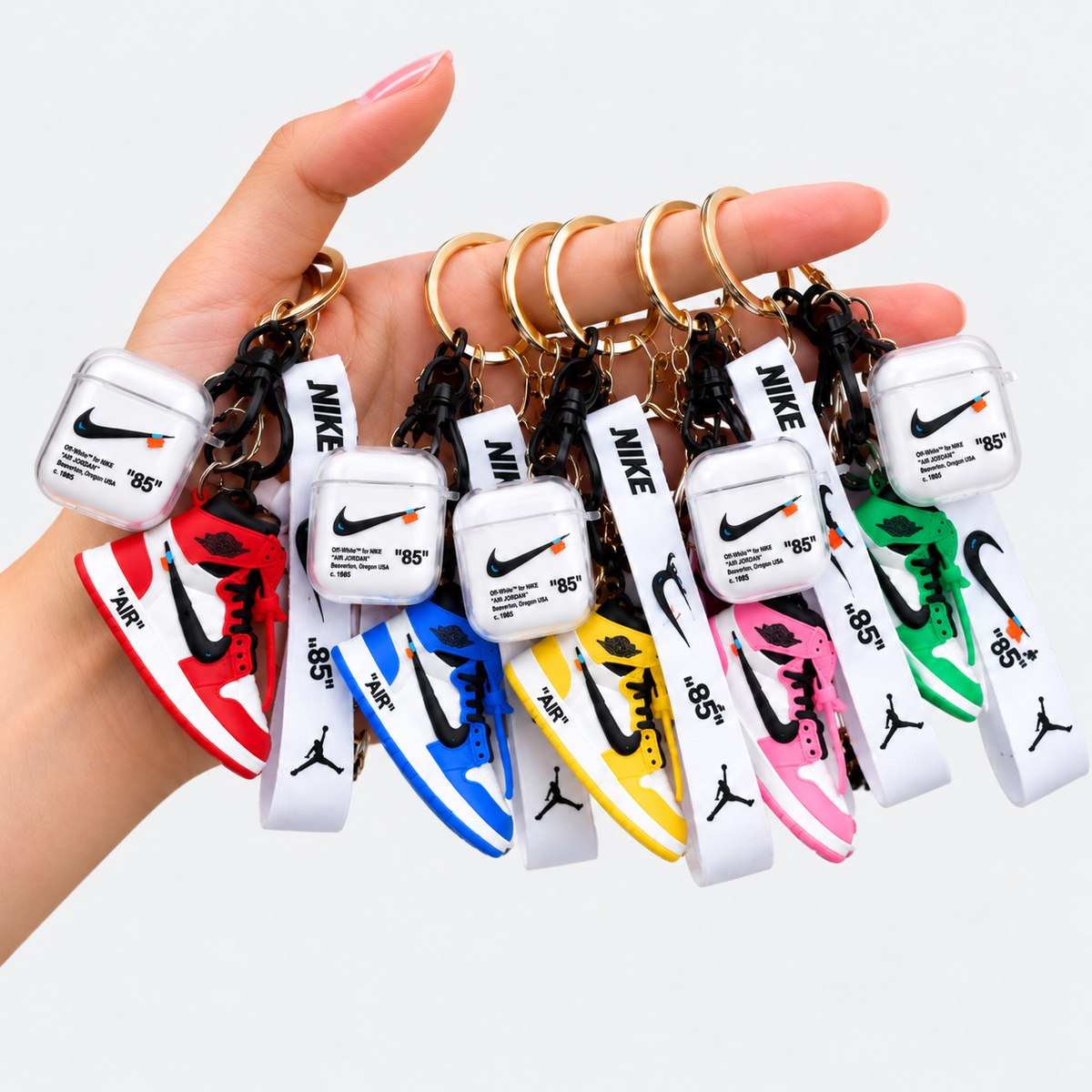 AirPod case with shoe keychain in clear TPU with sneaker charm