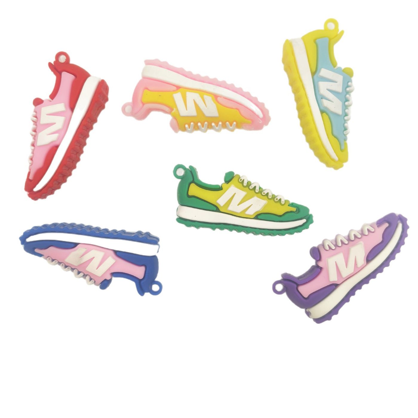 Six PVC sneaker keychains on a white background showing the full stock color range