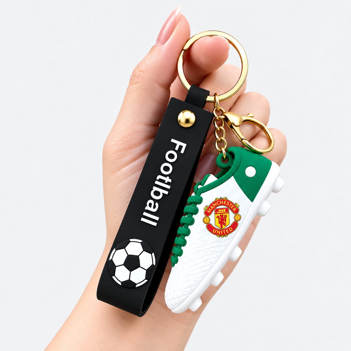 Green and white football shoe keychain with club crest detail