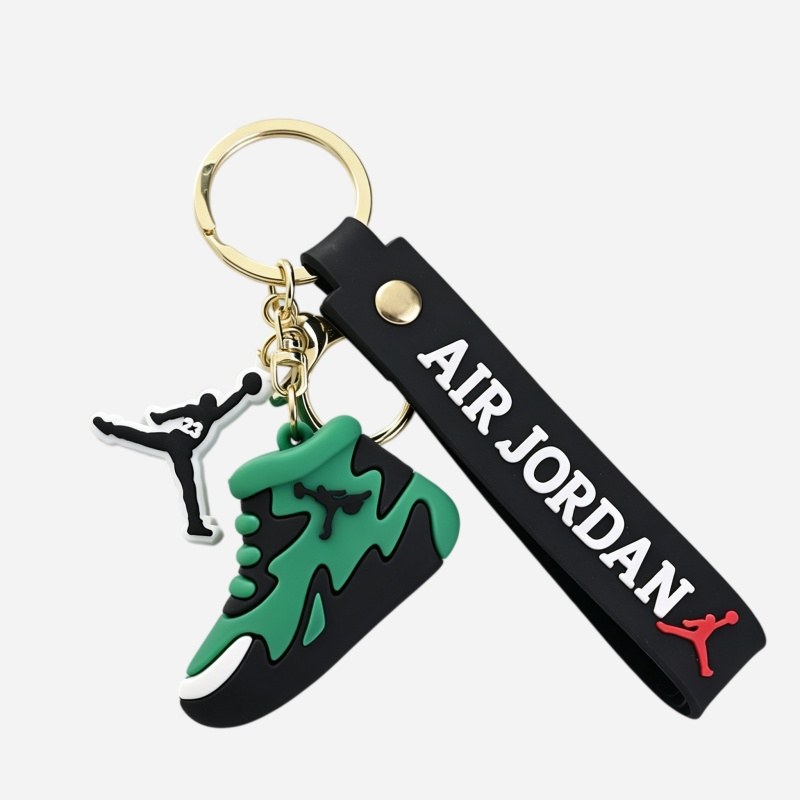 Jordan keychain in green and black, the splash pattern running from the heel of the sneaker through to the toe