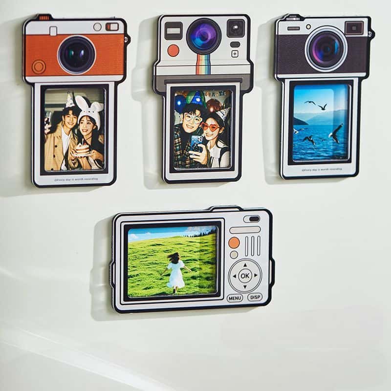 Peeling the protective film off a camera fridge photo magnet