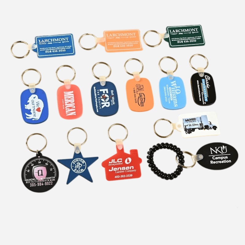 Promotional rubber key rings surface printed with company logos for corporate gifts