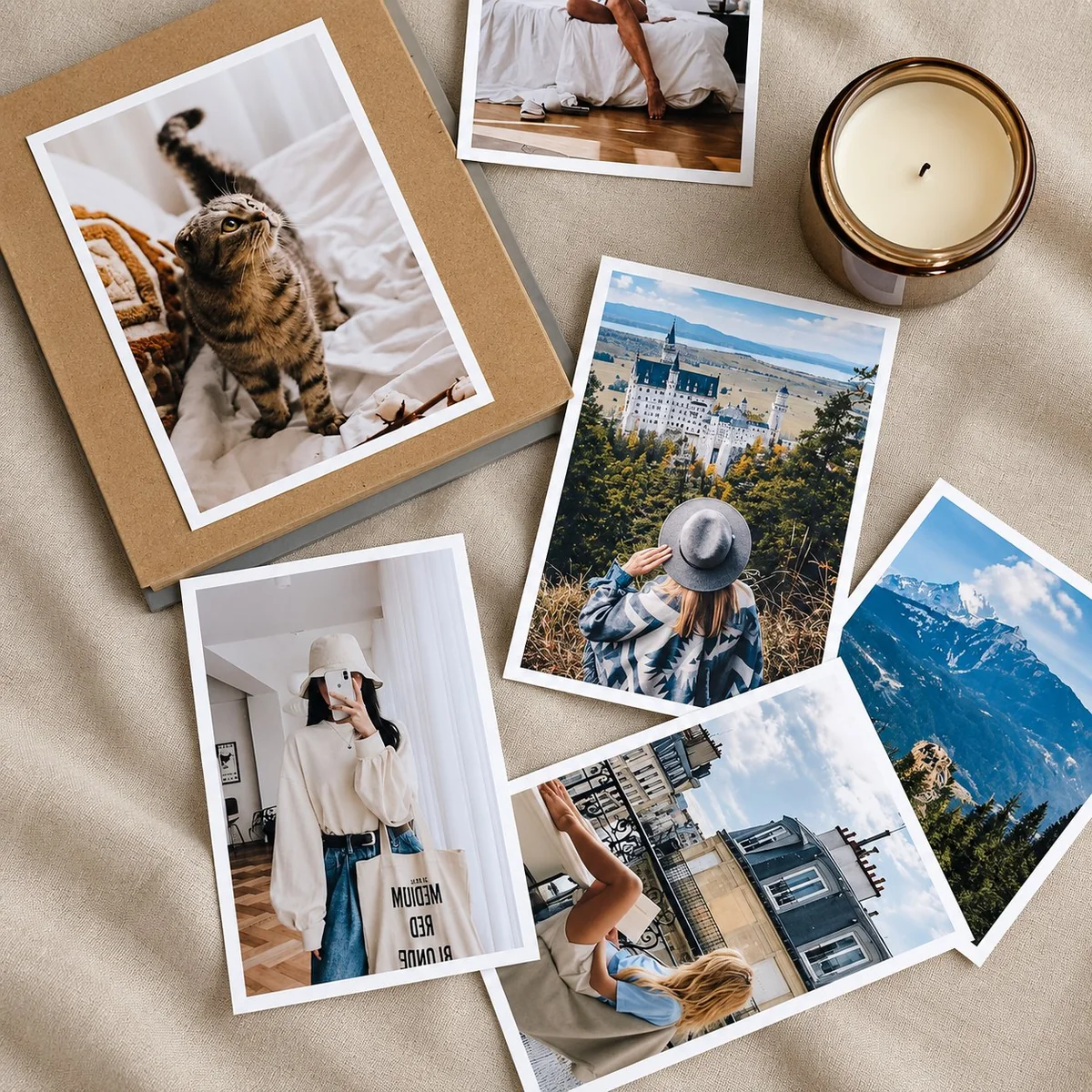 Standard 4x6 regular photo prints scattered on a white background