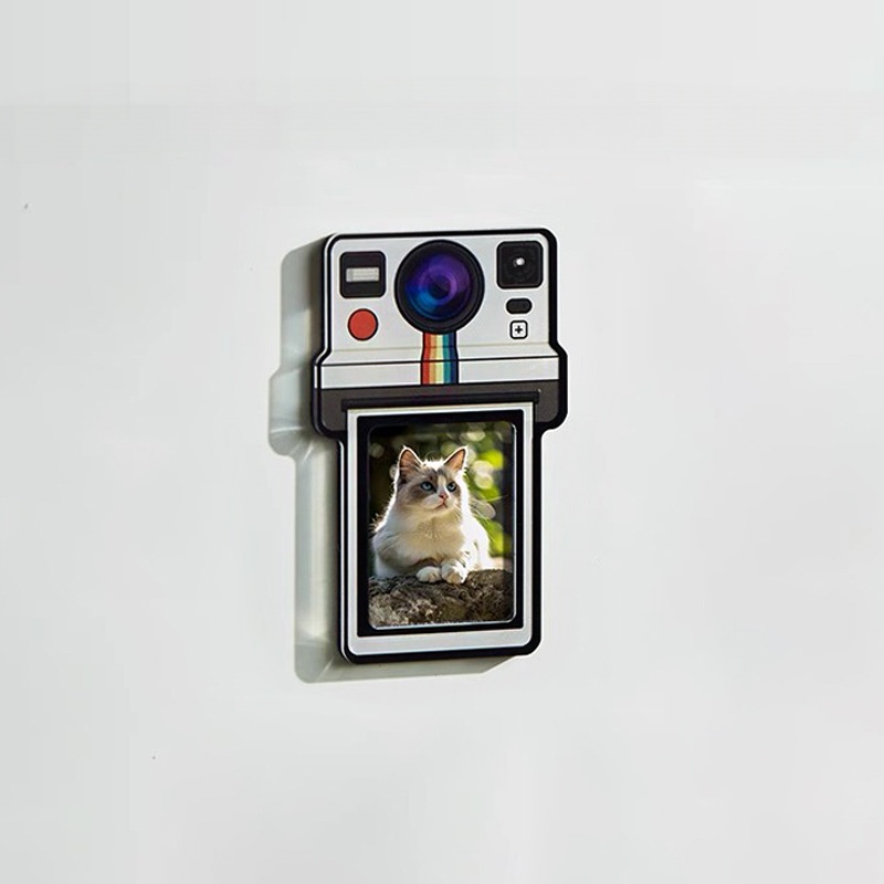 Orange retro camera fridge photo magnet holding a cat photo