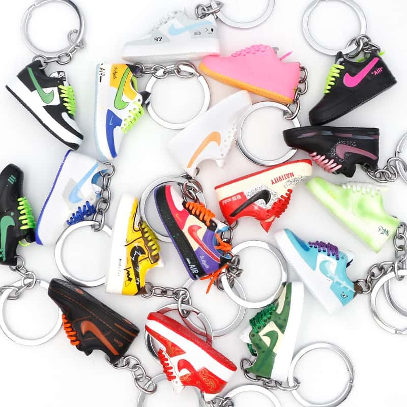 A spread of sneaker keychains in bright mixed colourways, showing the shade range available across our moulds