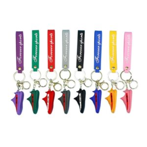Yeezy shoe keychains in nine stock shades, each one on a matching tag strap, laid out as a colour story