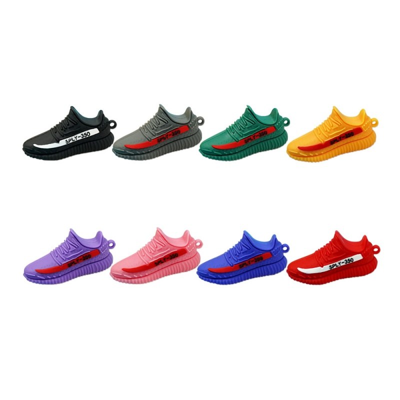 Yeezy shoe keychains in eight shades arranged in two rows, showing the low-cut runner shape and split midsole