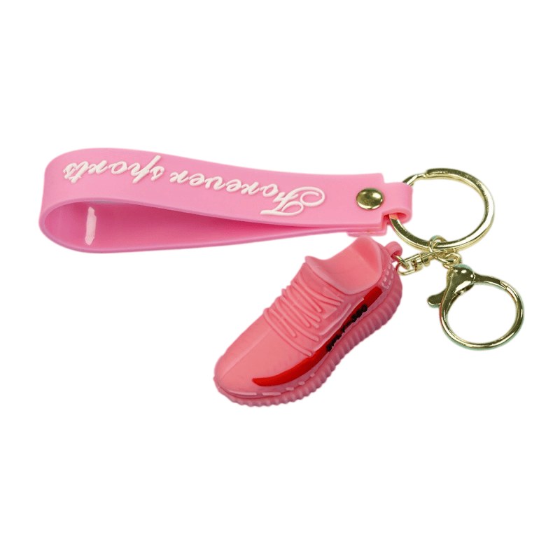 Yeezy shoe keychain in pink on a pink printed tag strap, matching the 19 g reference weight picture