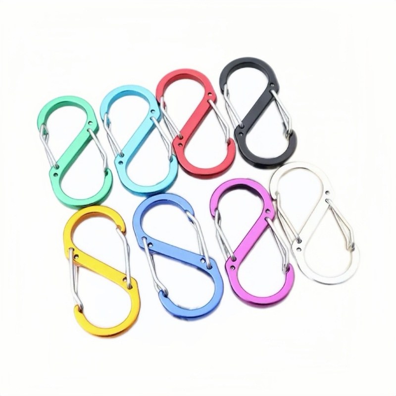Aluminum carabiner keychains arranged in a lineup of eight colors