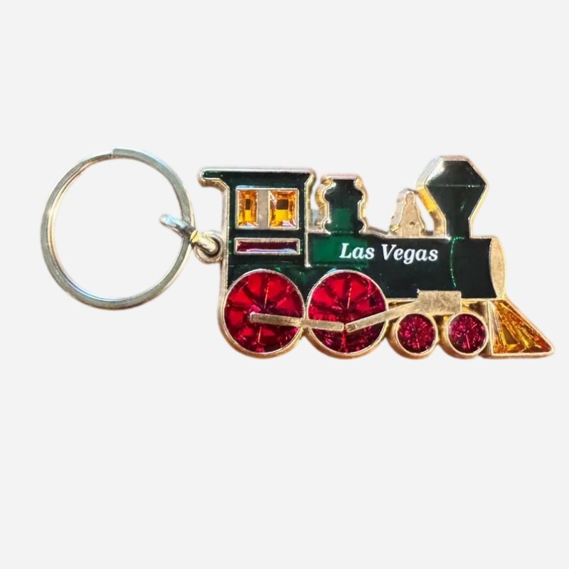 Enamel train keychain in the Las Vegas edition showing the printable body side