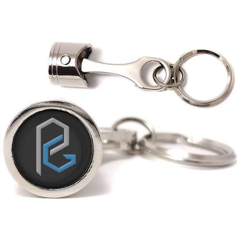 Metal piston keychain with a custom laser engraved brand logo on the round face