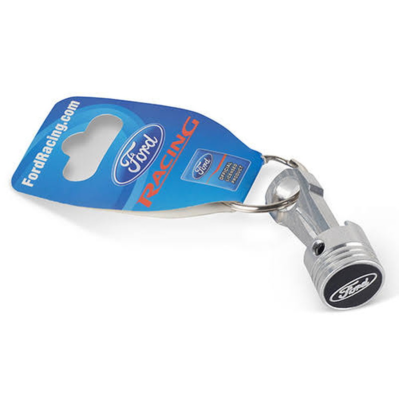 Chrome metal piston keychain packed on a printed blue hang card for retail