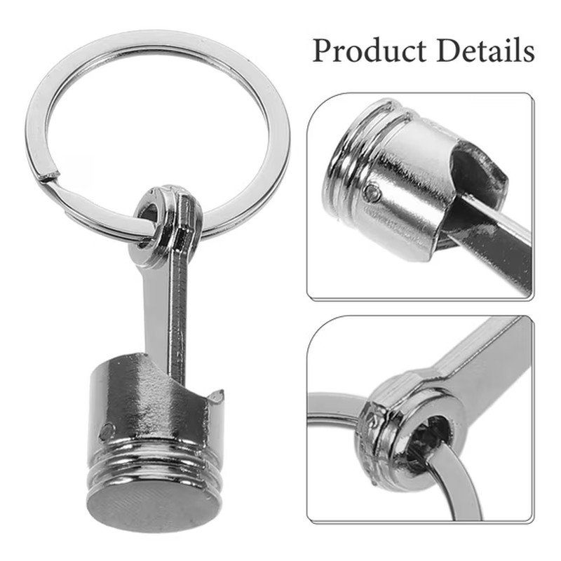 Close-up of the metal piston keychain head, ring and connector joint in chrome finish