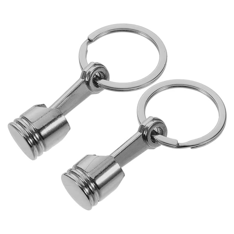 Zinc alloy piston keychain body with chrome plating and a plain round face