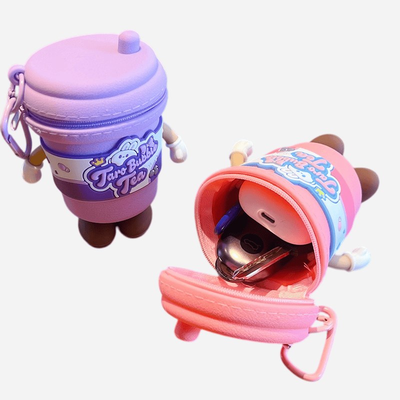 purple and pink milk tea cup keychain, pink one open holding earbuds and keys