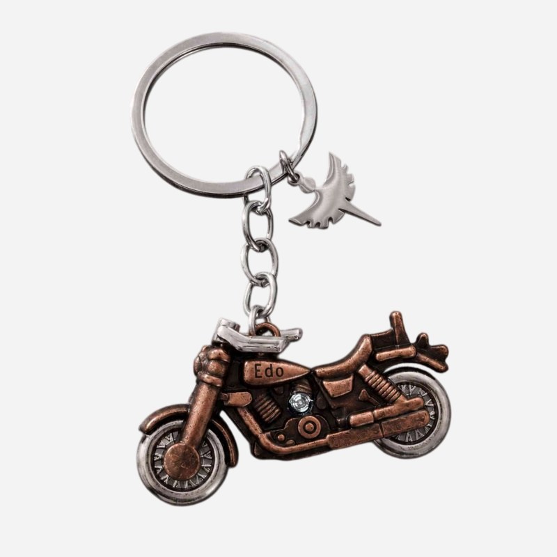 Bright gold motorcycle metal keychain ready for custom engraving