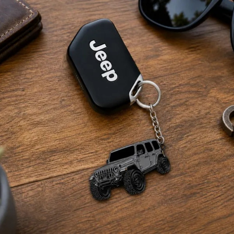 Off road suv keychain: next to a car key fob