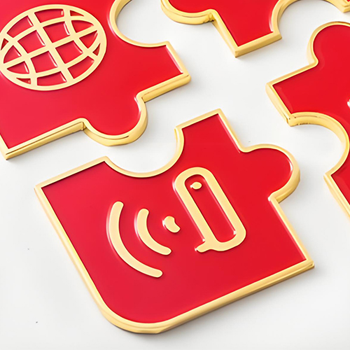 Custom fridge magnets finished with soft enamel colour fill