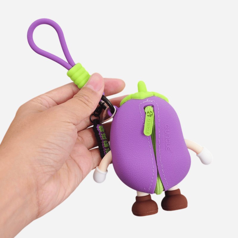 hand holding the eggplant shape with its tag