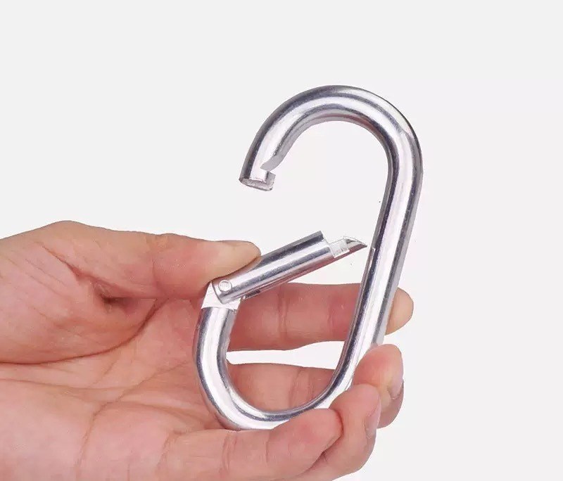 Steel snap hook keychain held in hand showing the spring gate open