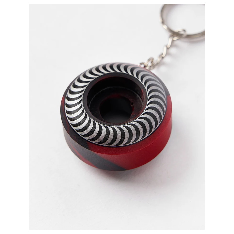 Spiral graphic spitfire wheel keychain side close-up showing the black and white print