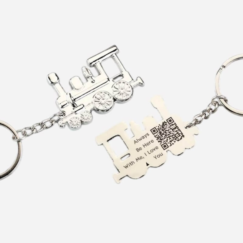 Vintage train keychain back plate laser engraved with a message and QR code