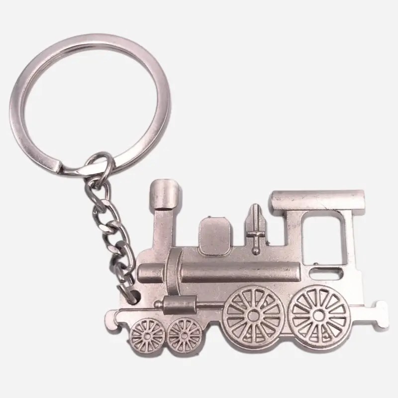 Macro view of the polished surface and casting lines on the vintage train keychain